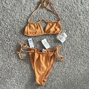 WeWoreWhat ruched string bikini